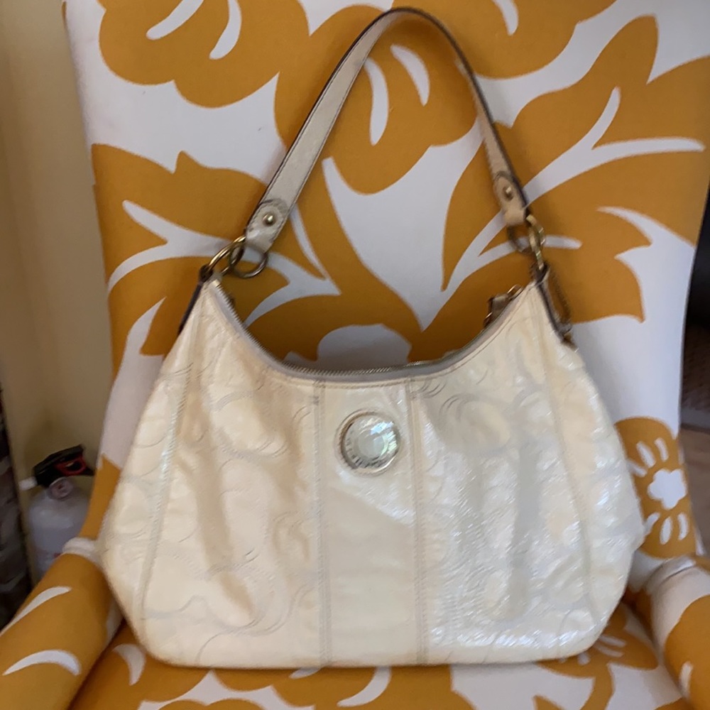 Cream/ivory colored authentic coach purse.